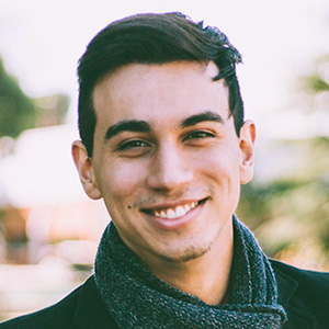 headshot of a person smiling